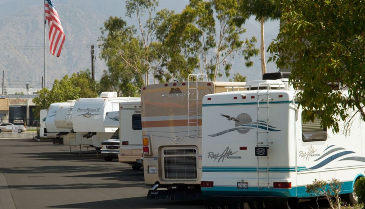 RV's parked in spacious outdoor parking storage area