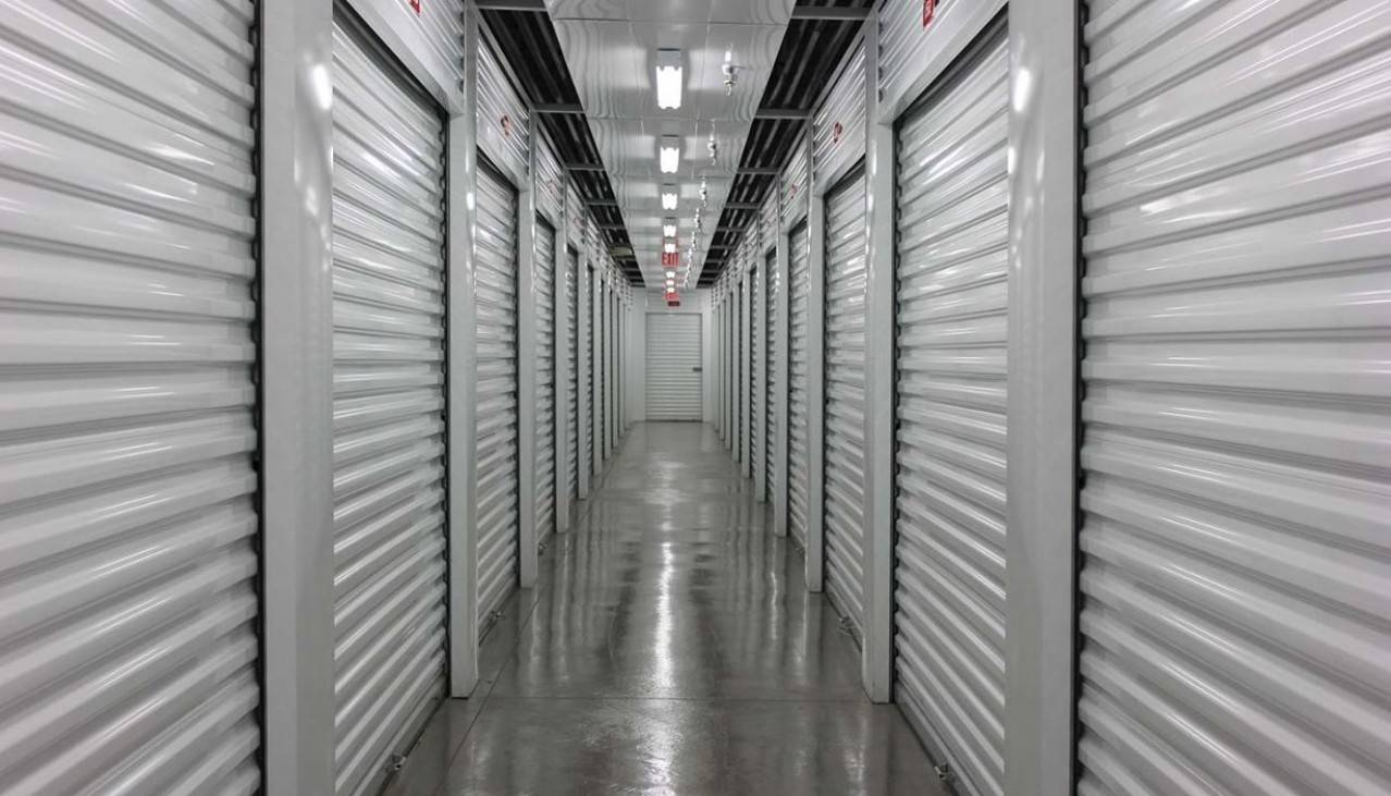 Interior hallway with a variety of storage unit sizes with roll up doors