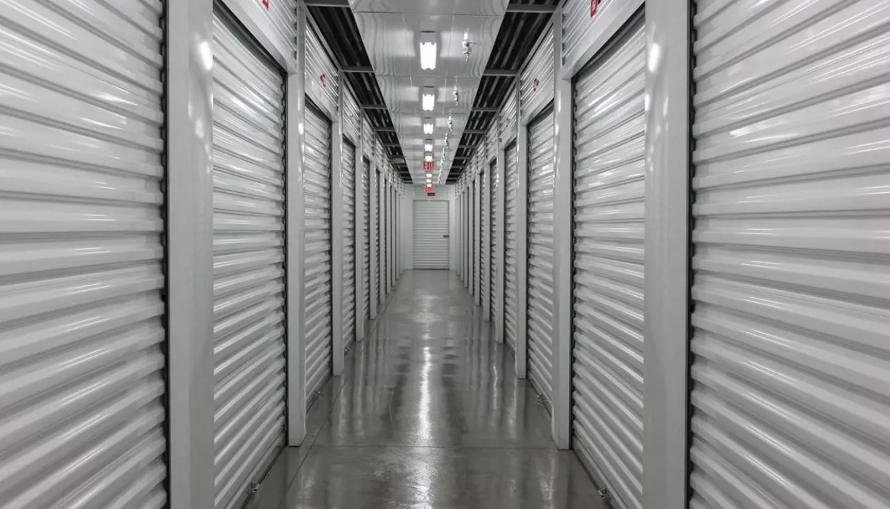 Interior hallway with a variety of storage unit sizes with roll up doors
