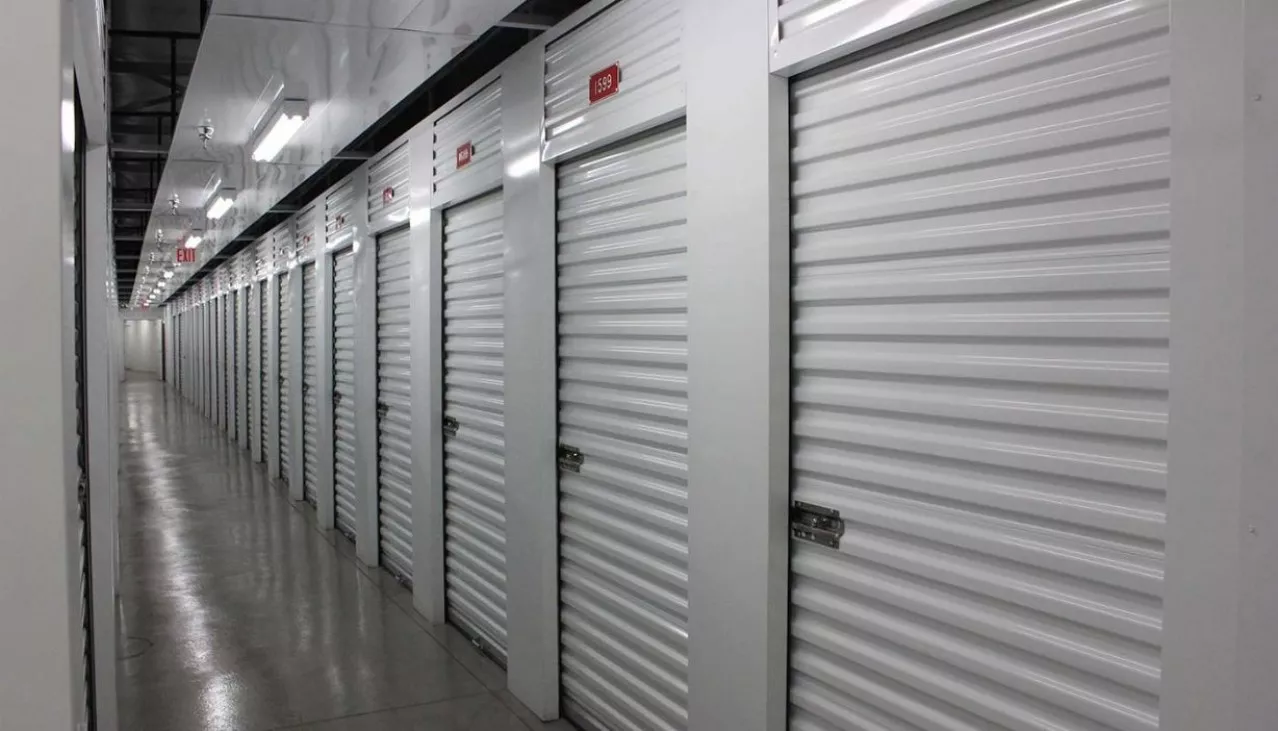 Interior hallway with a variety of storage unit sizes with roll up doors