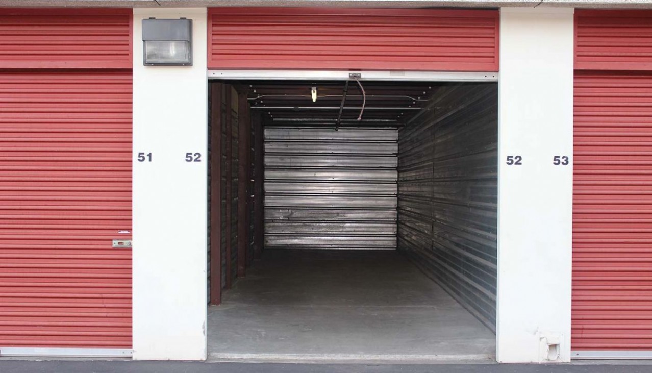 Garage sized drive up storage unit with metal walls and roll up door