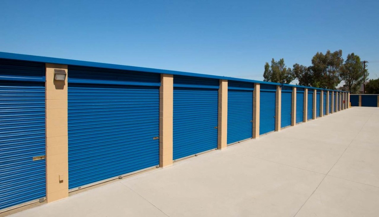 Garage sized drive up storage units with metal roll up doors
