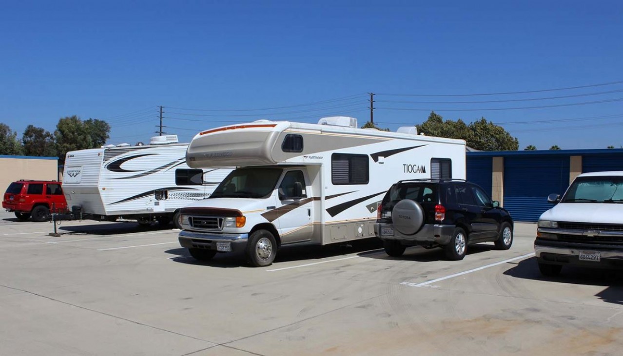 RV and SUV parked in vehicle storage parking spaces