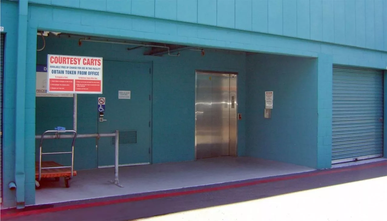 Price Self Storage Pacific Beach elevator access to building levels next to courtesy moving cart station