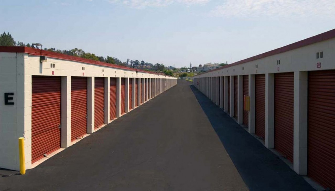 Drive-up self storage unit with aluminum walls and rolled up door