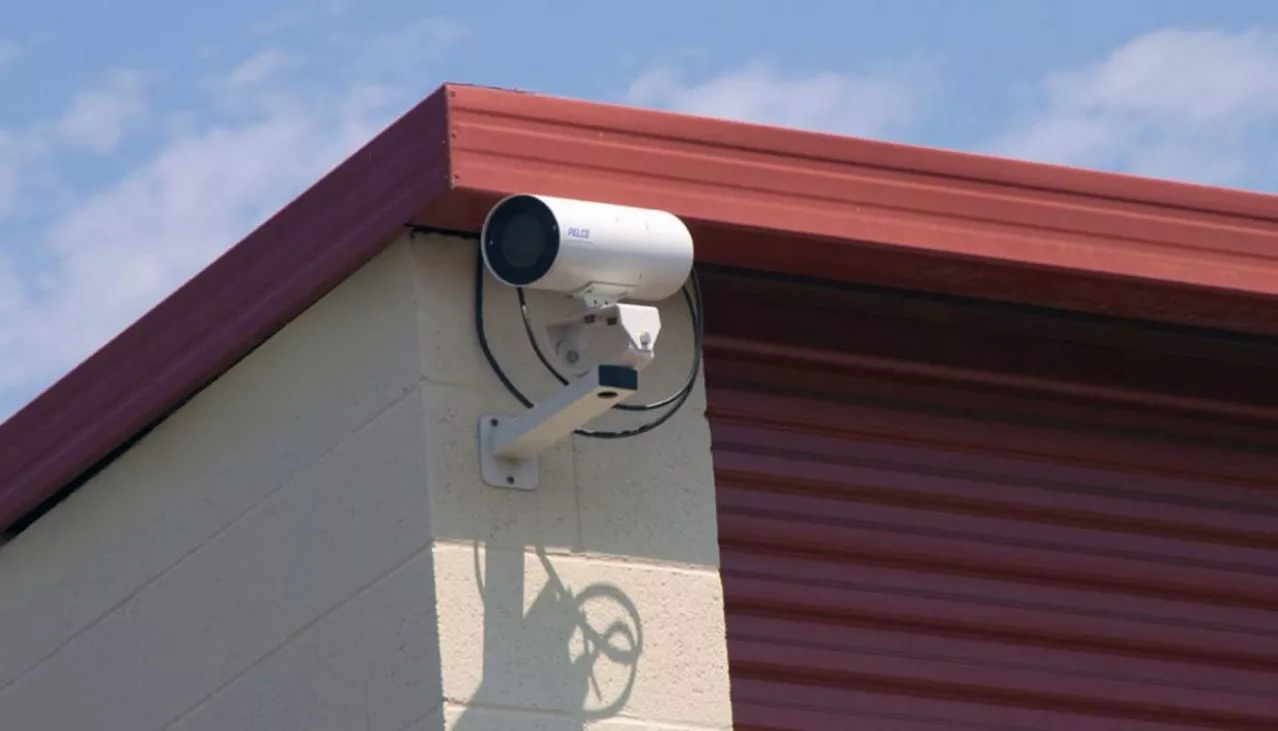 Video security camera mounted on the corner of a building