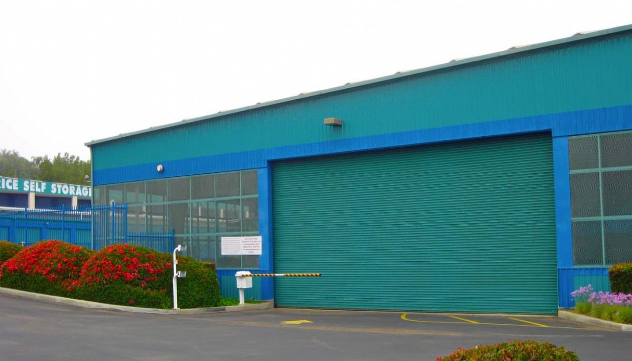 Rollup door closed to secure the entrance to indoor vehicle parking building