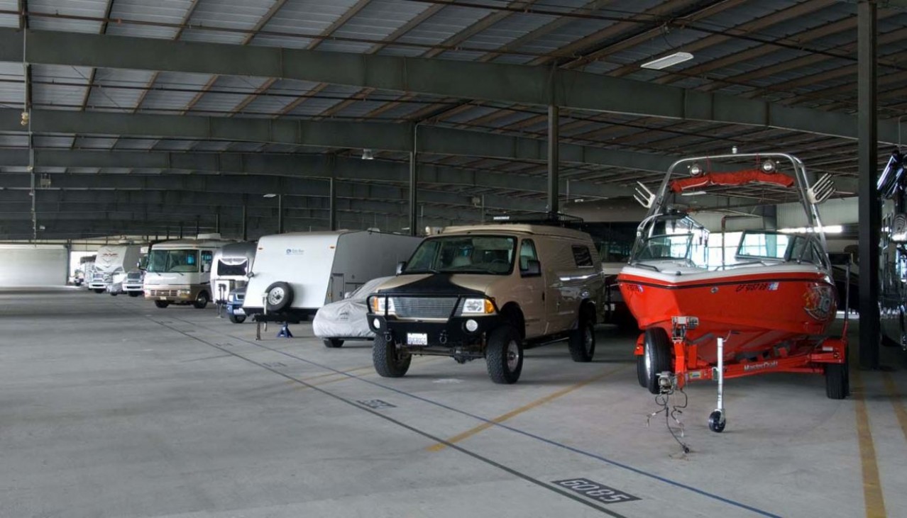 RV's and boats parked indoor storage facility