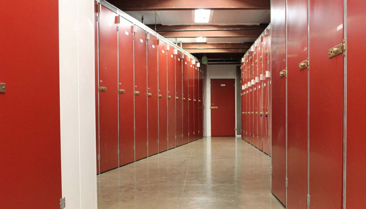 View of aisle of large wine storage lockers