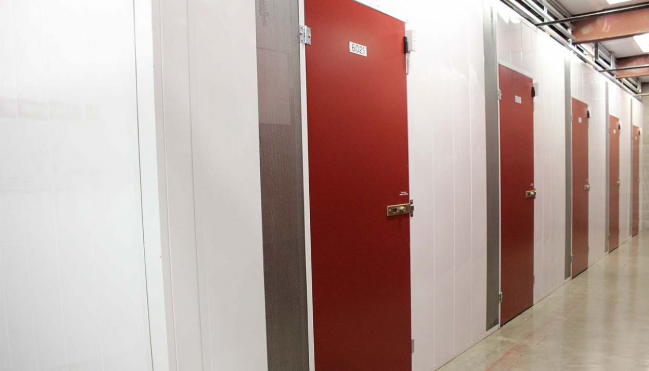 Interior hallway with doors of 500 case capacity wine storage rooms in special area
